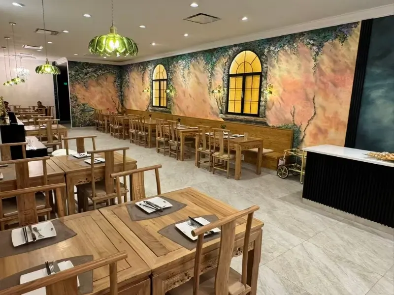 Dining area with a floral mural wall and arched windows at Silver Spring Sichuan Bistro, a Chinese Restaurant in Silver Spring