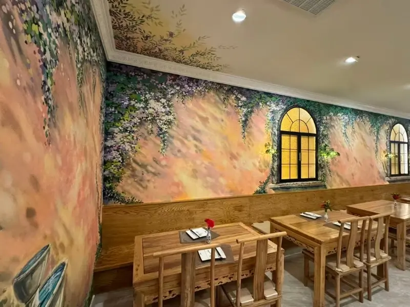Dining space with a colorful floral mural wall at Silver Spring Sichuan Bistro, a Chinese Restaurant in Silver Spring