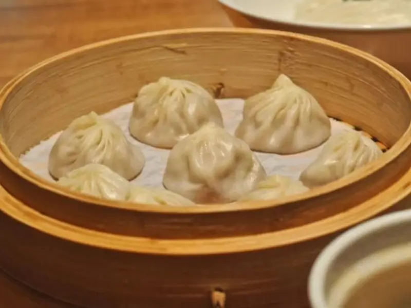 Steamed dumplings with soup inside at Silver Spring Sichuan Bistro, a Chinese Restaurant in Silver Spring