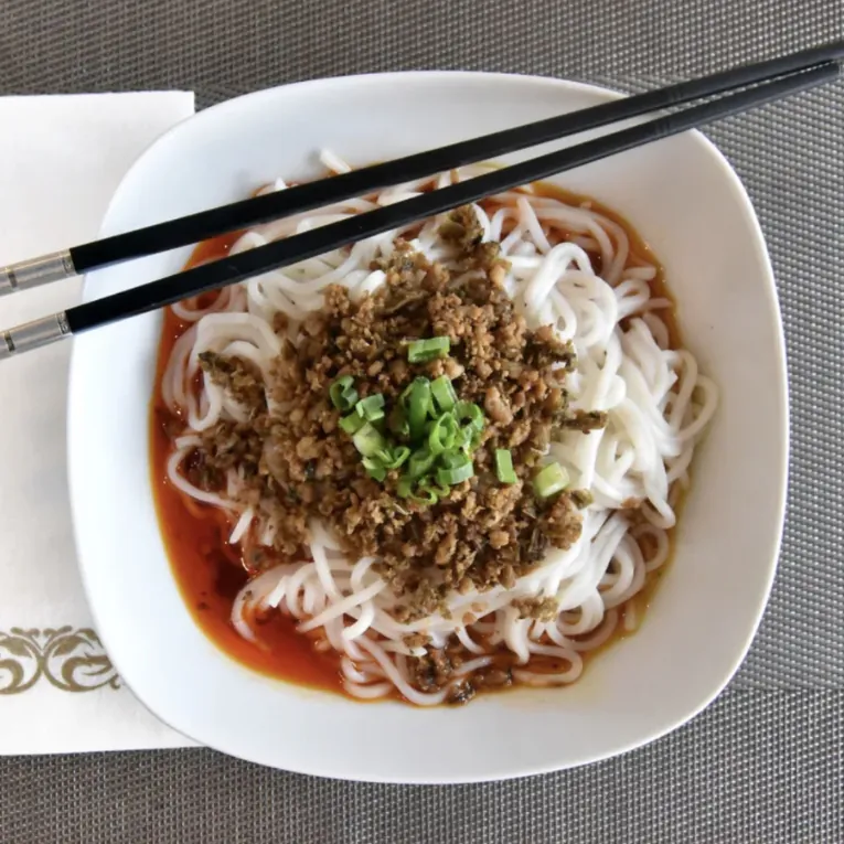 Savory Dan Dan noodles with minced meat and spicy sauce at Silver Spring Sichuan Bistro, a Chinese Restaurant in Silver Spring